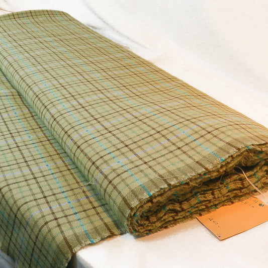 Light green wool with blue and brown stripes